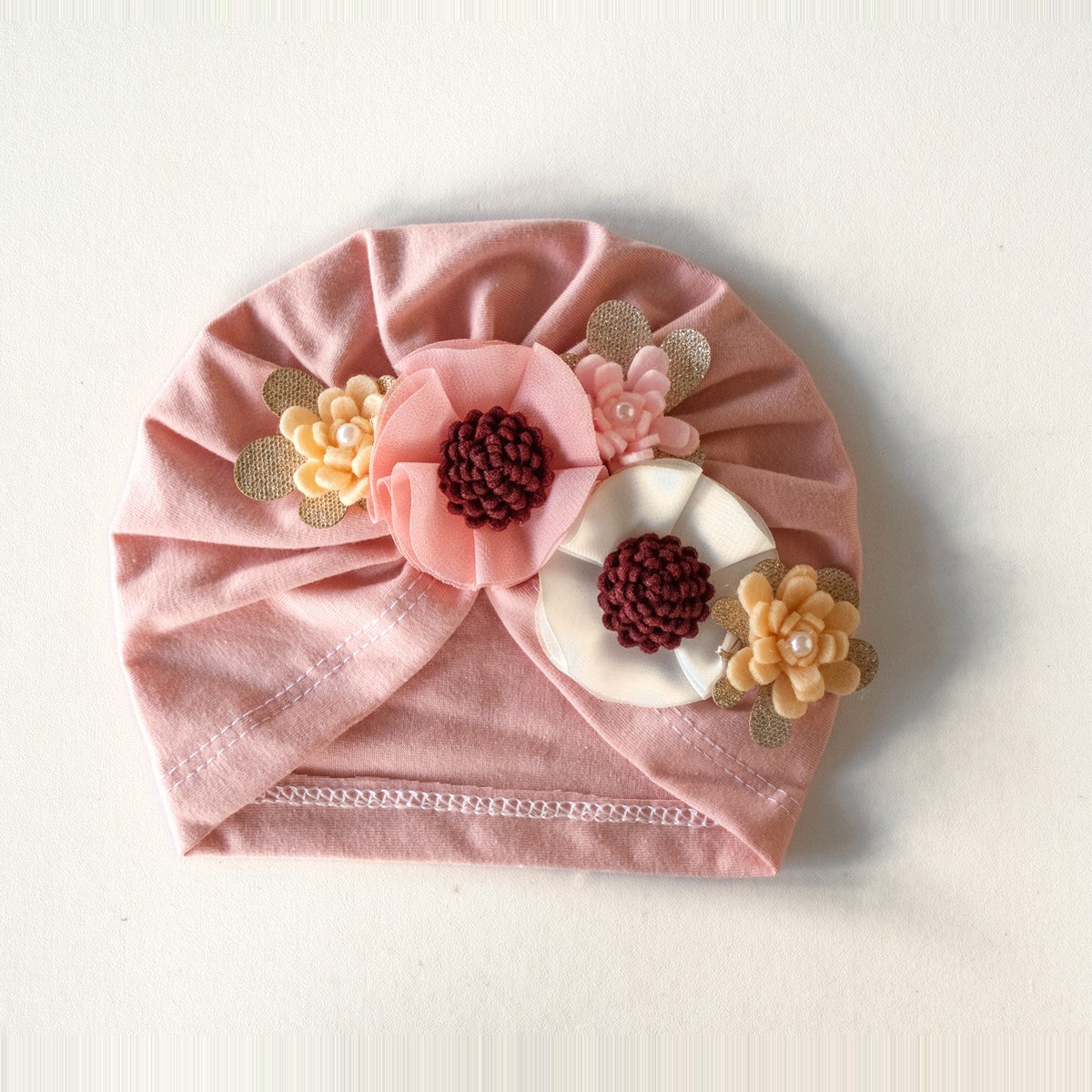 Gorro para bebé con flor · Flor – color Rosado