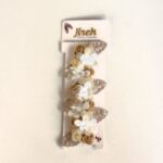 Tocado para bebé con flores y mariposas · Amatista – color Beige